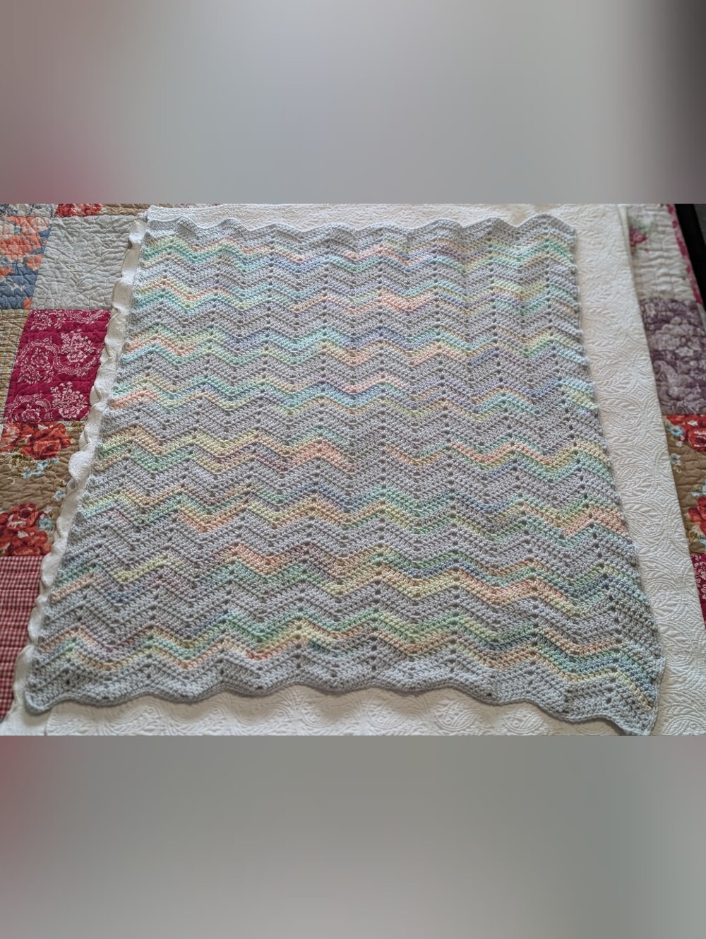 Vintage hand crocheted baby blanket pastel rainbow colors zig zag pattern 37x34"